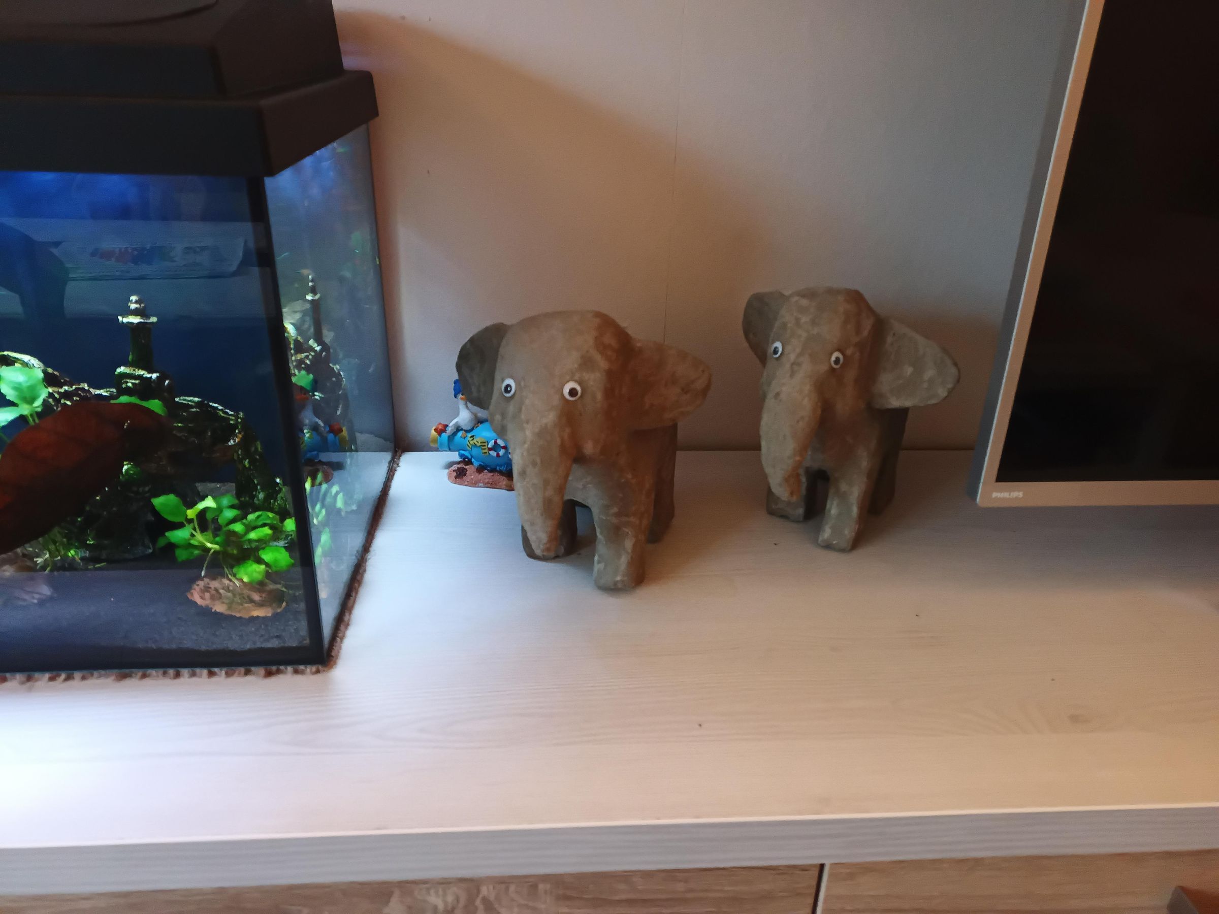 Small Elephant From Cardboard and Concrete