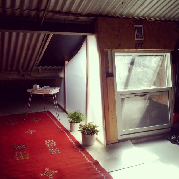 Replace a wall with corrugated plastic for more light