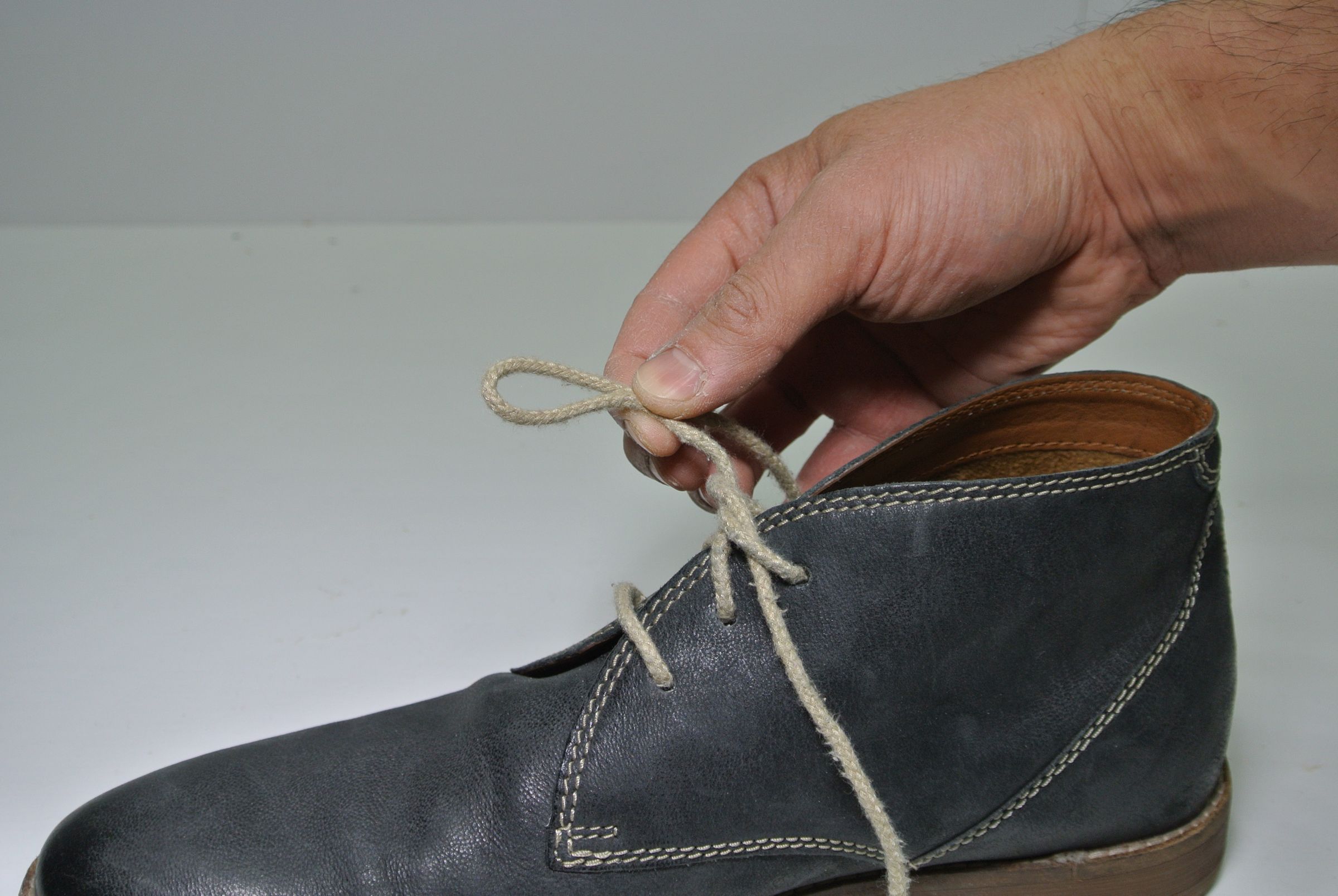 Image showcasing Standard Shoelace Knot - Ian's Shoelace Site