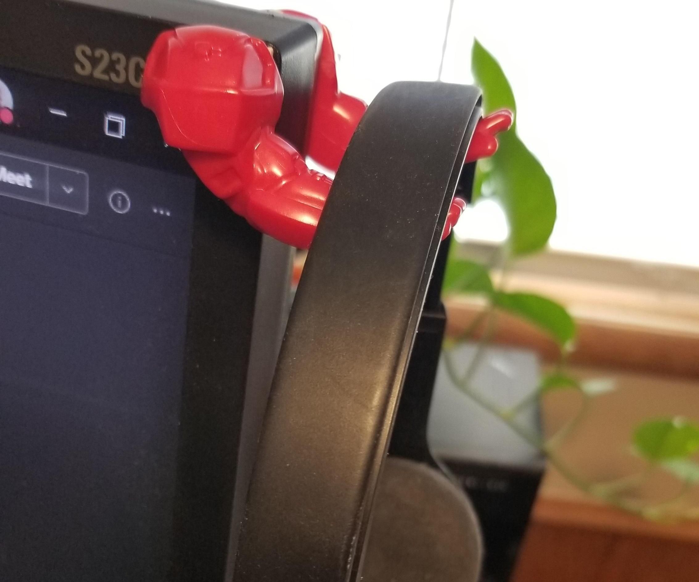 Quirky Headphone Hanger From Junked Action Figure