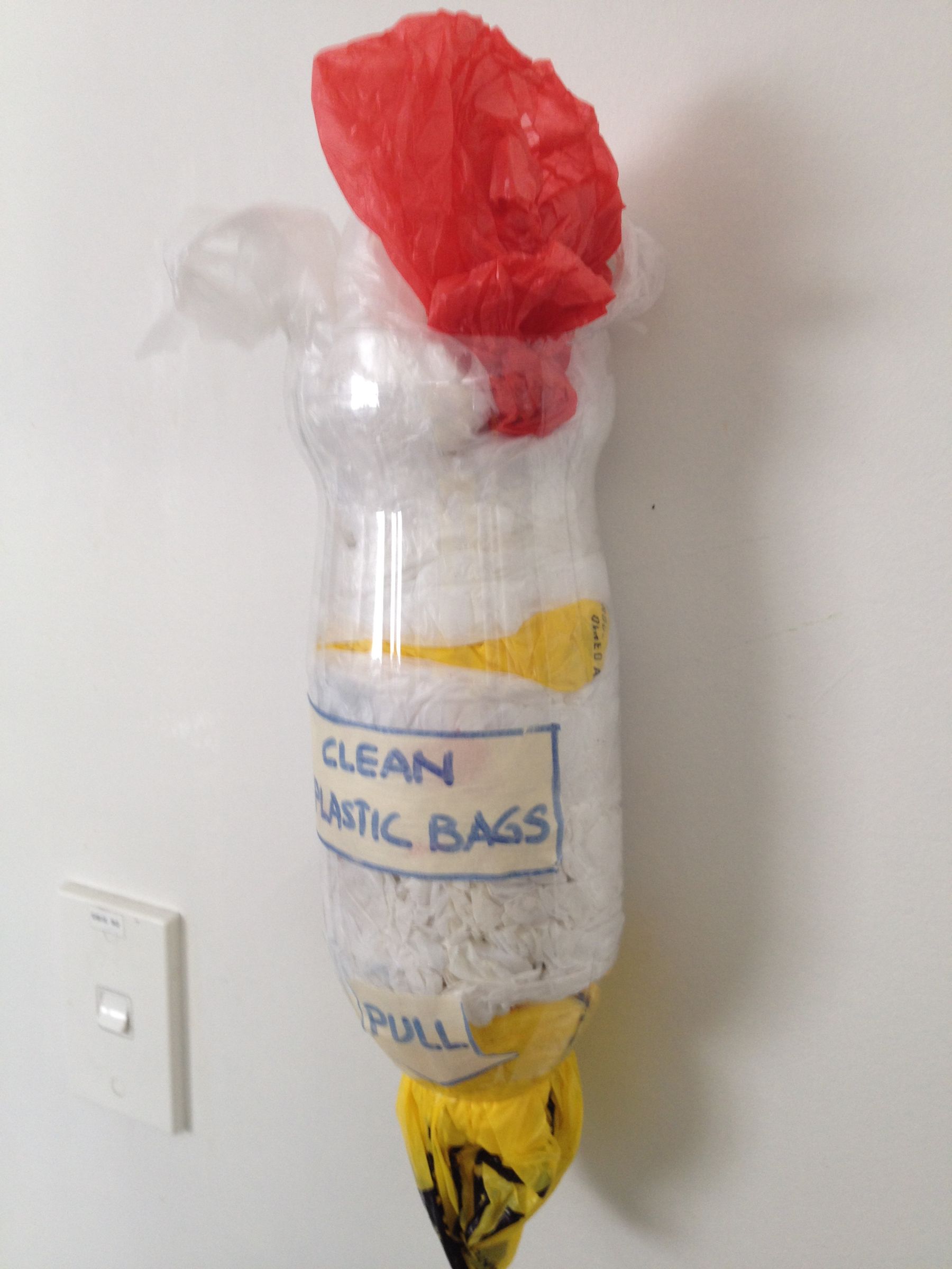Soda Bottle plastic bag dispenser