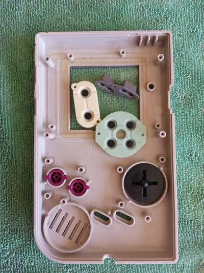 Dis-assembly of Holster, Game Boy, and Wiimote