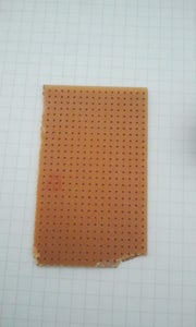 Enlarging the Holes of a Perfboard - Mac Gyver Style