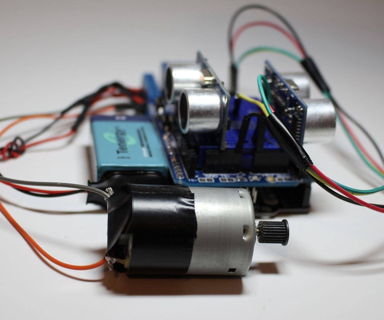 Control a Motor Using Ultrasonic Distance Sensors (HC-SR04)