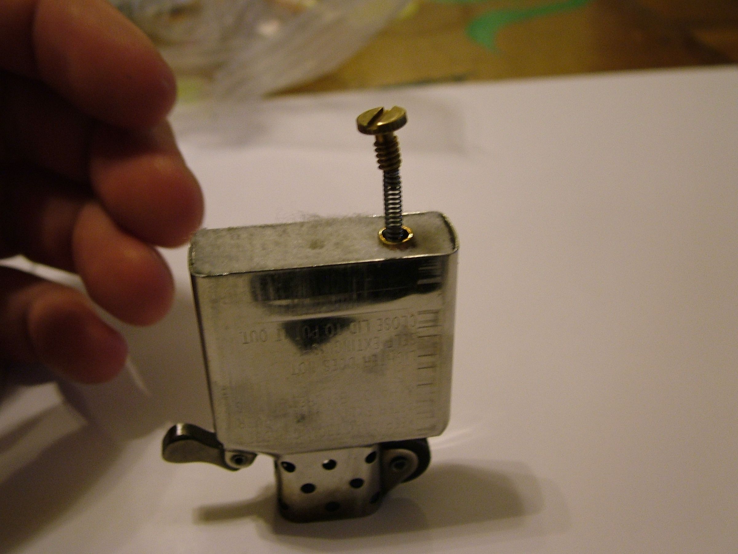 Replace Your Zippo Flint With Flint From a Dead BIC 4 Steps