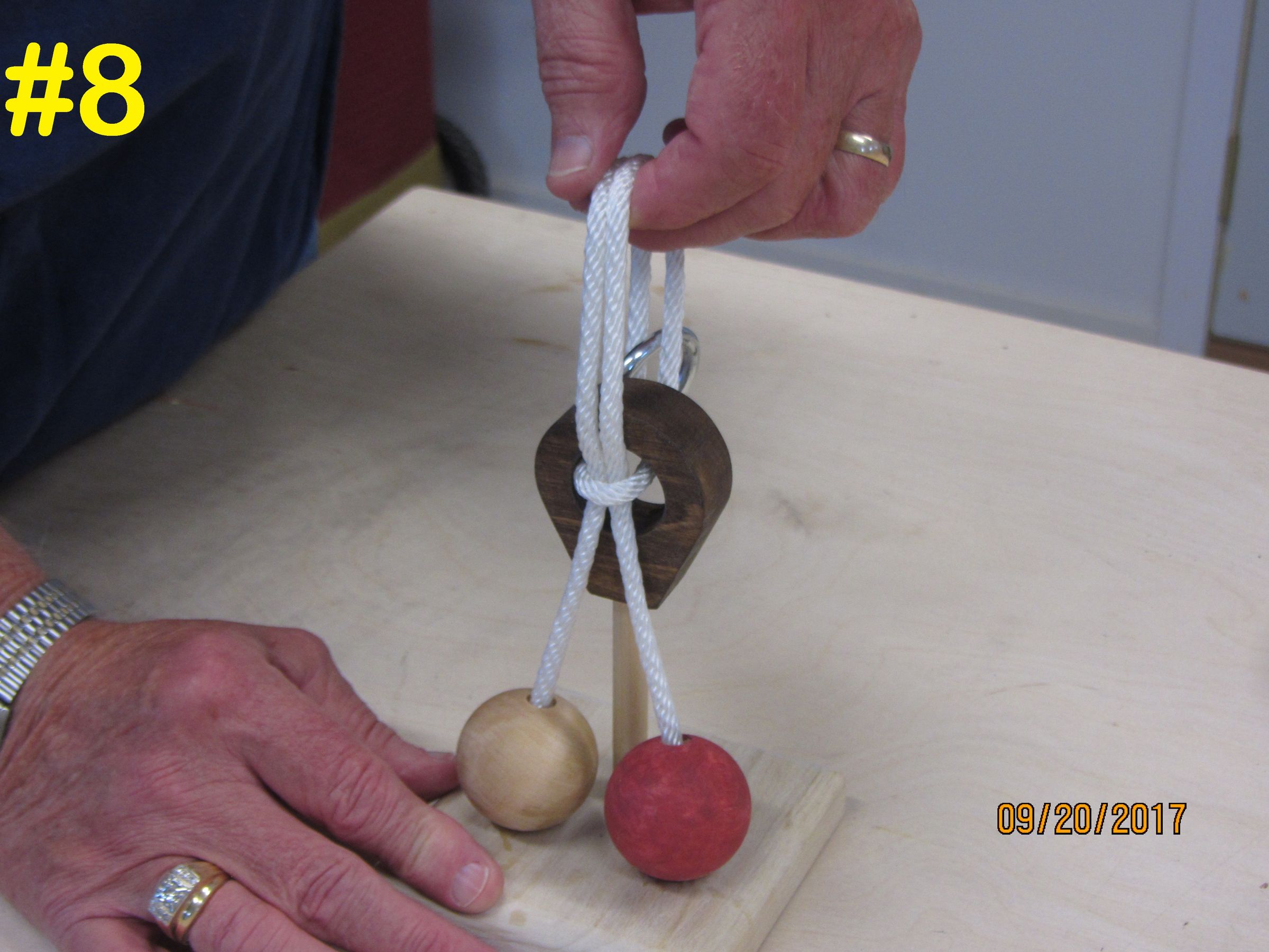 Wood Ball Metal Ring Rope Puzzle 16 Steps (with Pictures