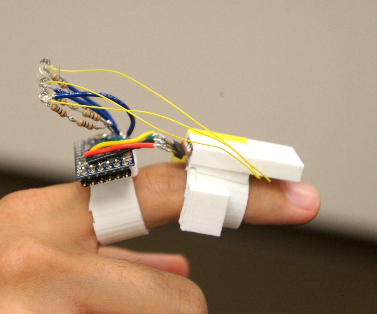 Maestro - Finger Mounted Input Device to Control the Cursor.