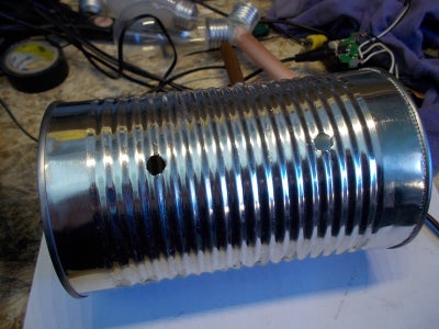 Drill Two Holes for the Wires and Another One for the Switch in the Tall Can