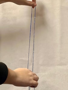 Find Middle of Your Tinsel and Feed 1/2 Through the Loop