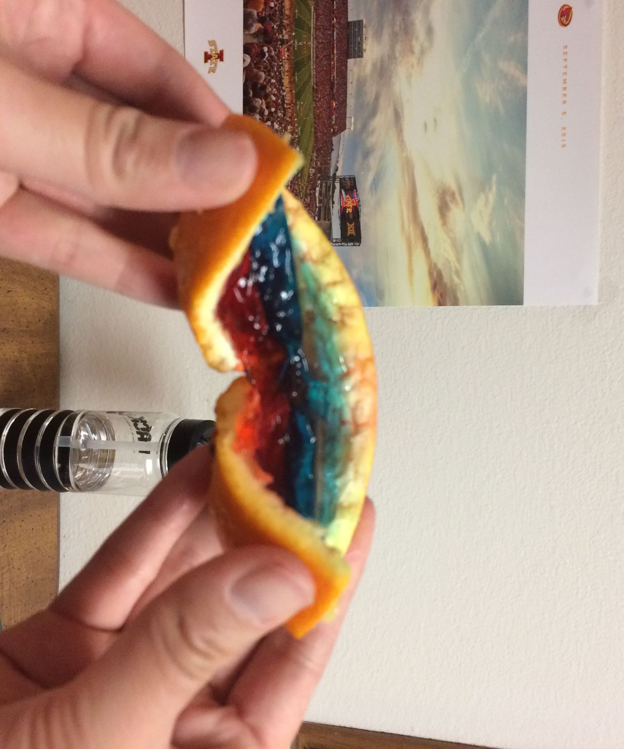Layered Jell-O Shots in Oranges