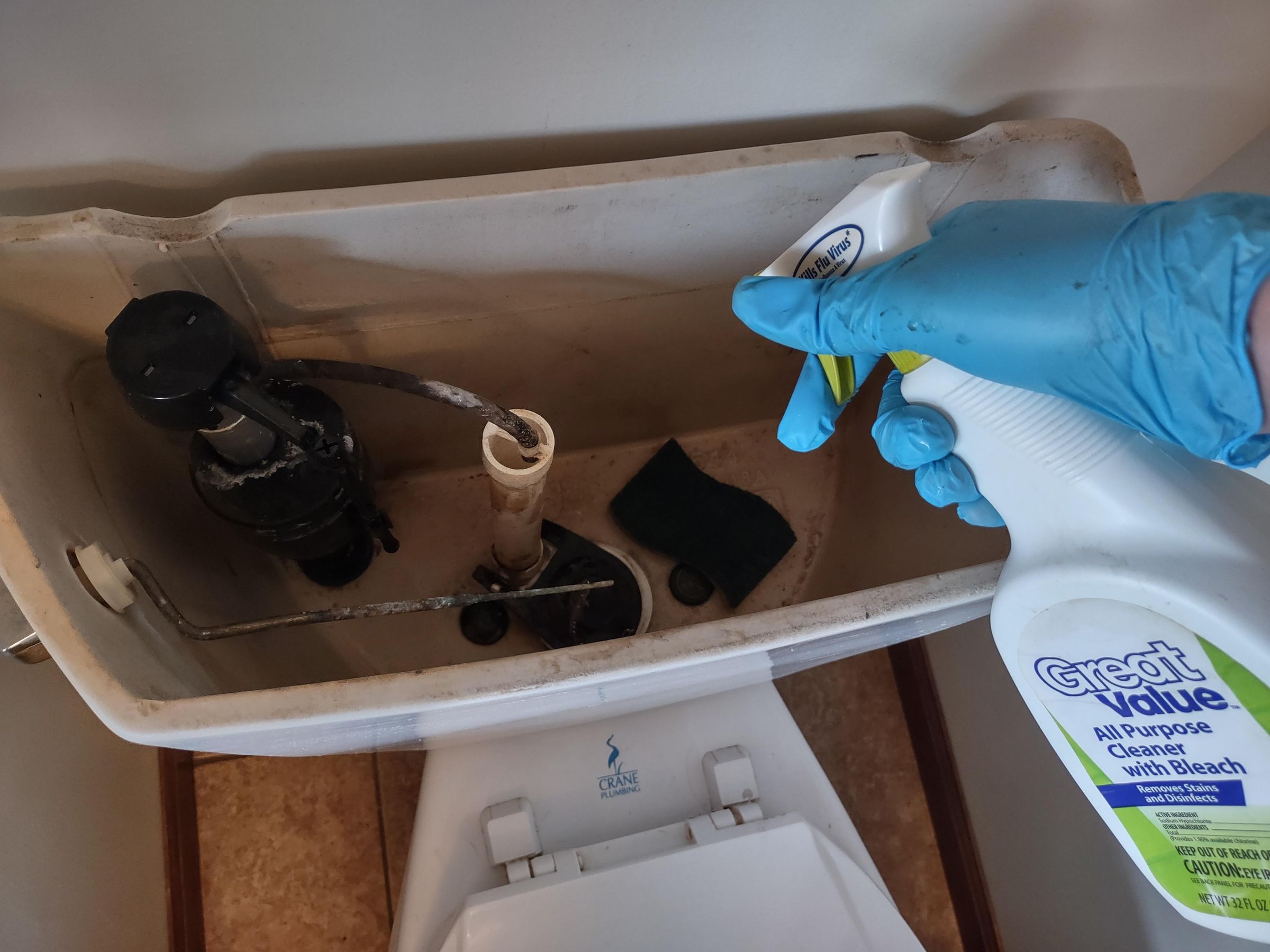 Fix a Toilet Tank Loose Handle, Discolored Water, and High Water Level