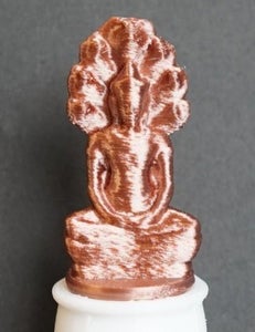 Buddha Meditating Under a Naga