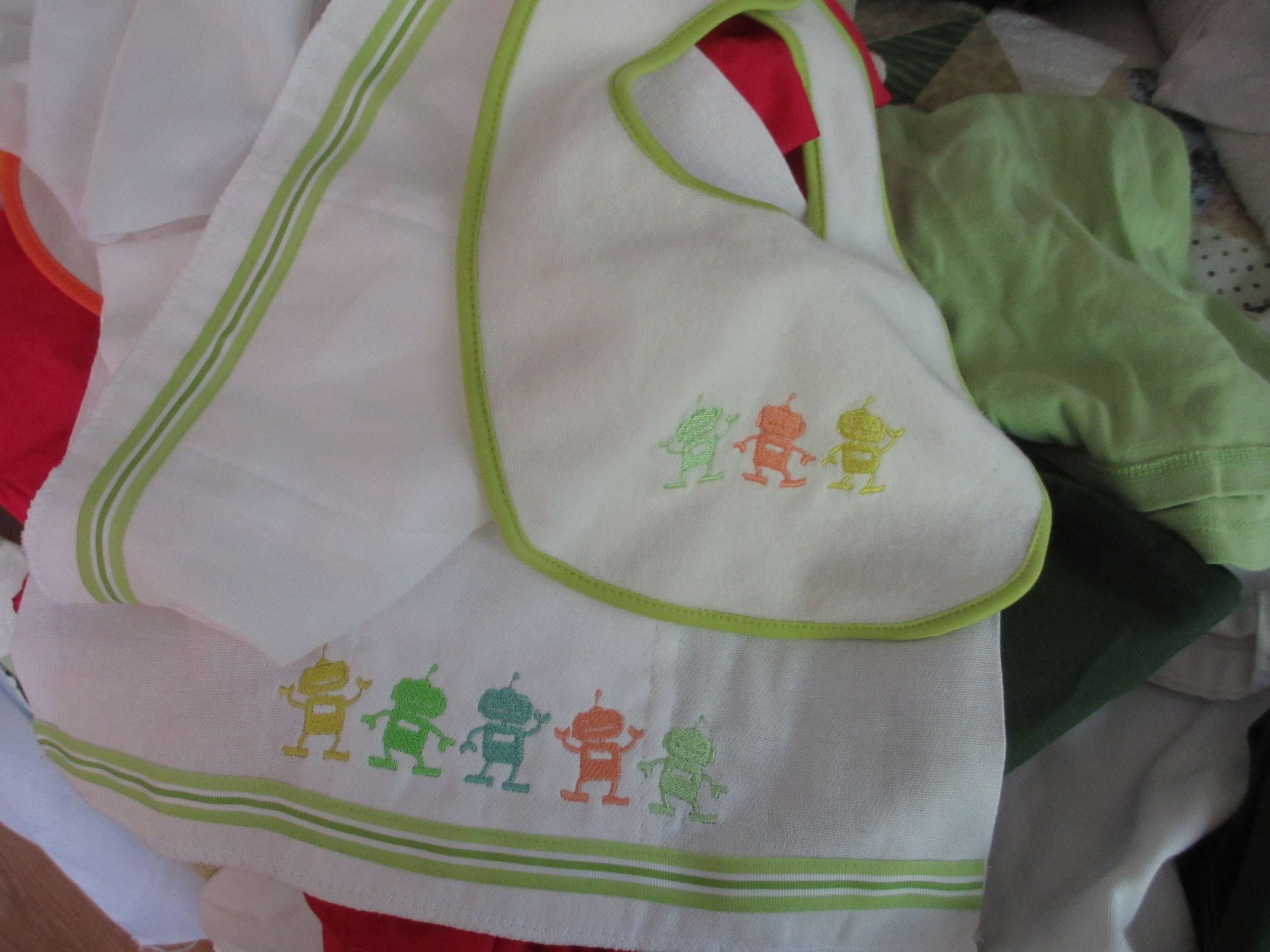 Embroidery for a Bib and Burp Cloth Set.