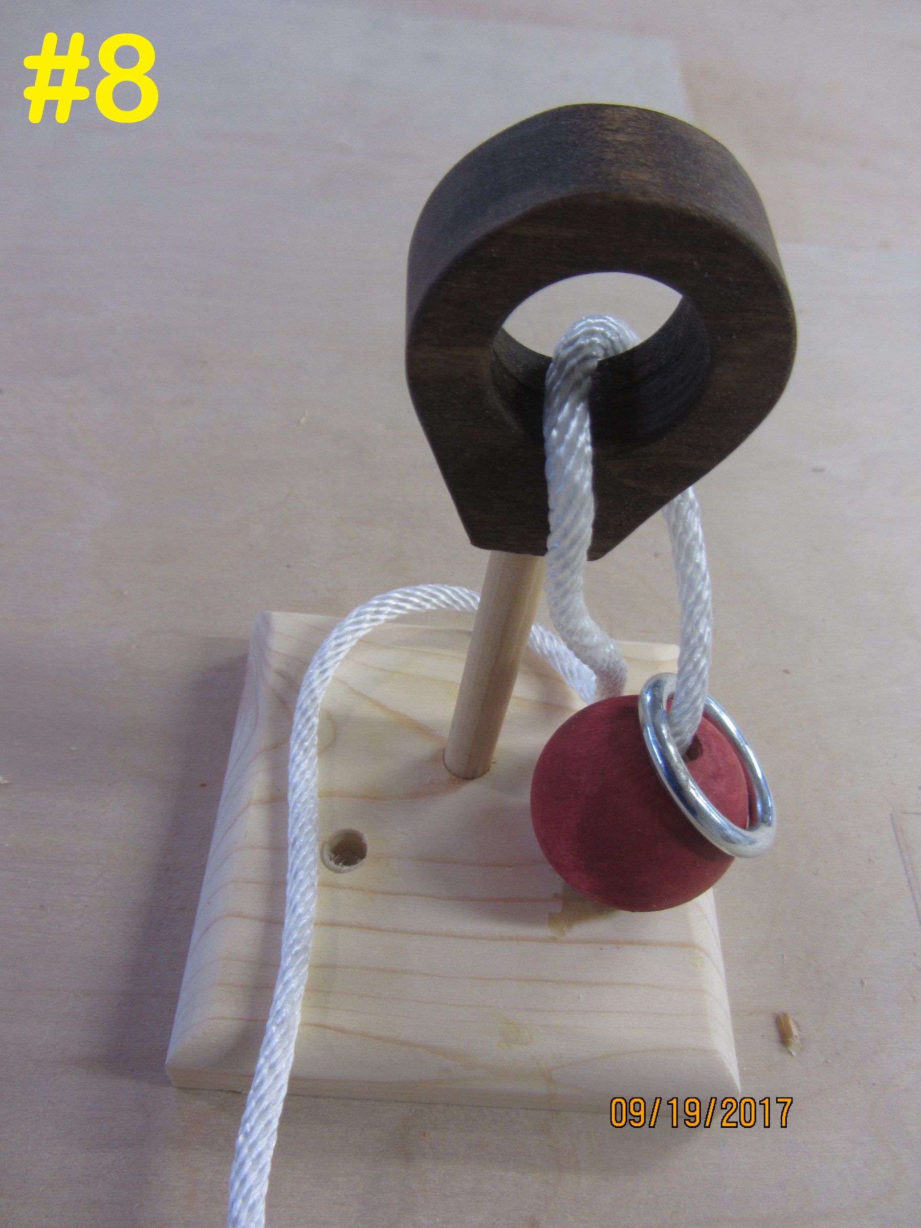 Wood Ball Metal Ring Rope Puzzle 16 Steps (with Pictures