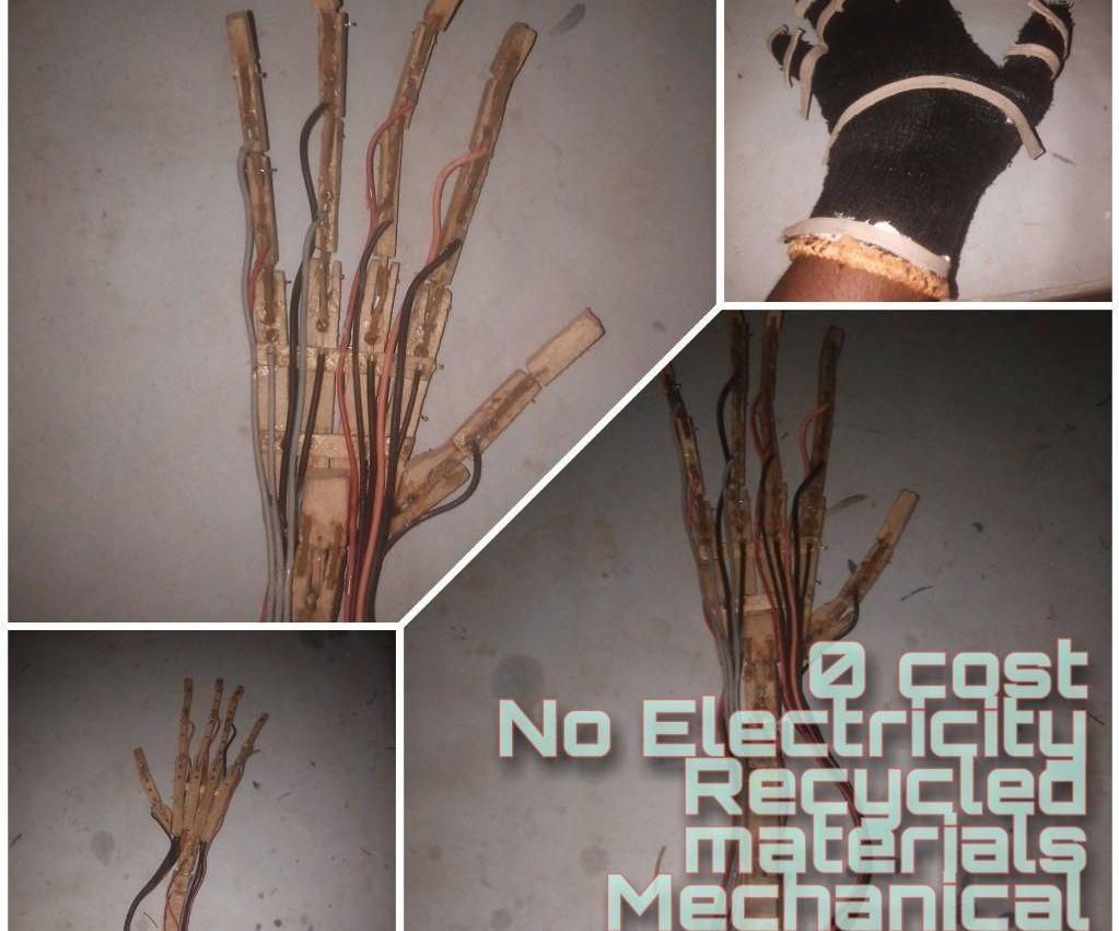 How I Made a Mechanical Hand. No Electricity and All From Junk.