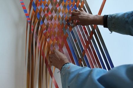 Attach Unnumbered Strips to Upper Right Bracket and Weave Through Other Strips