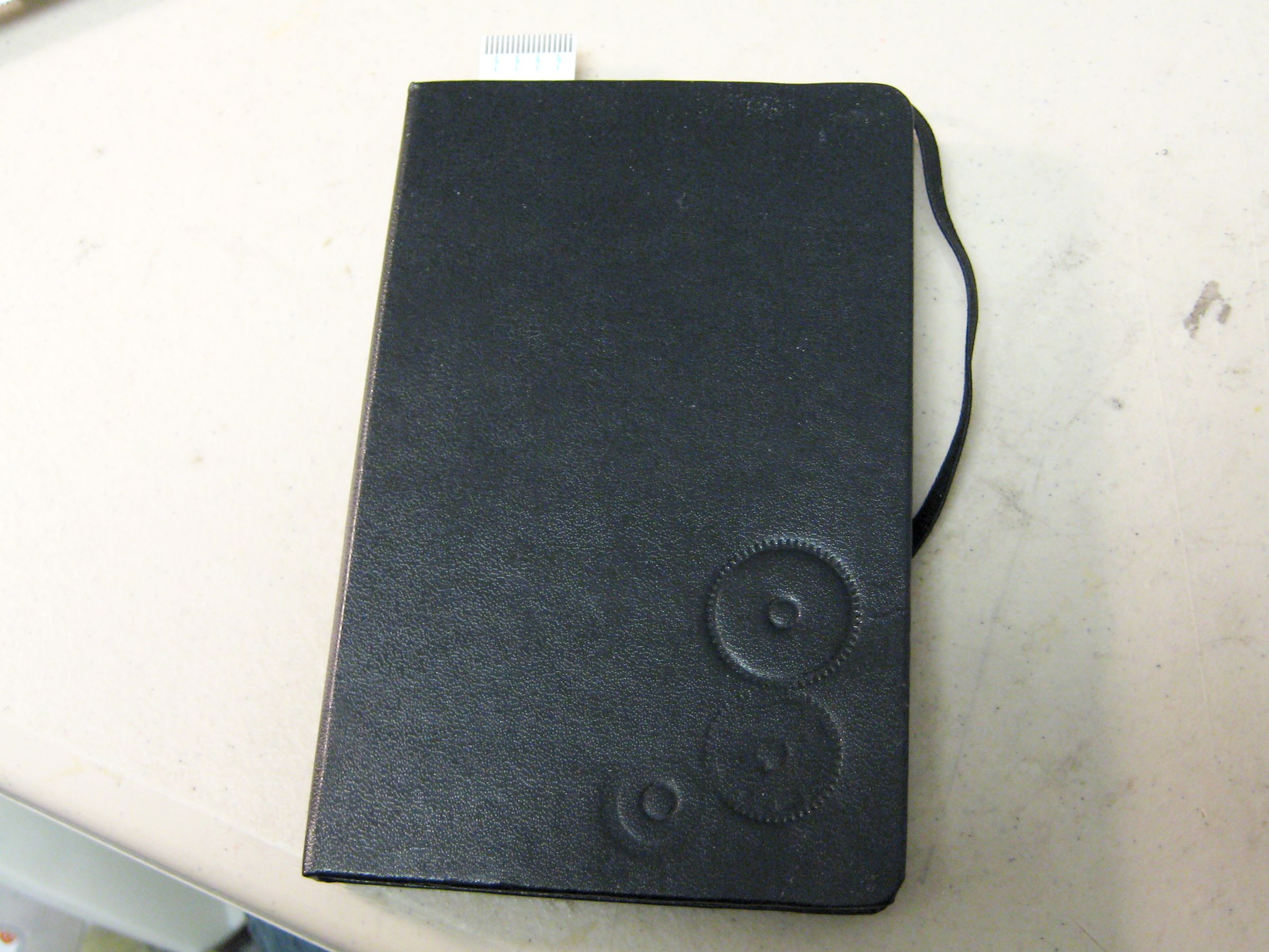 Embossing a Moleskin With Gears 8 Steps Instructables