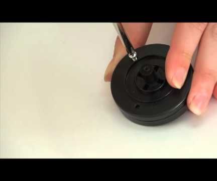 Disassembling BObsweep's Front Wheel for Cleaning