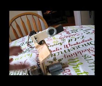 Goosestepping Robot (Passive Ramp Walker Propelled by Movable Weight)