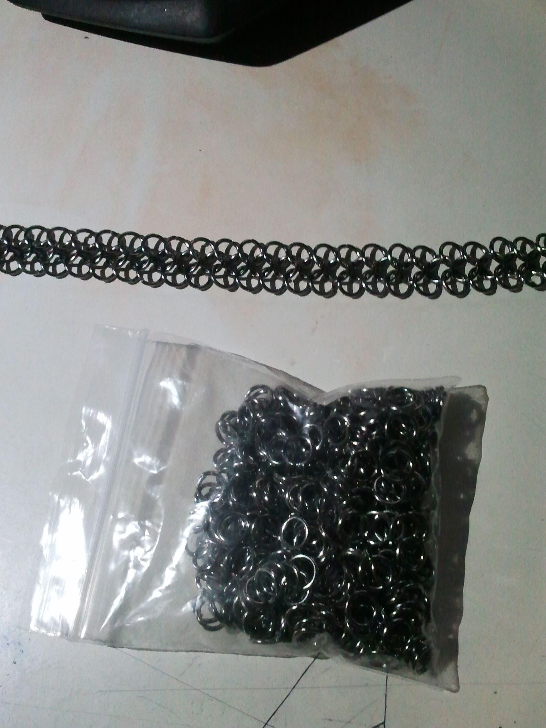 European 4-in-1 maille (chainmail) row aligner.