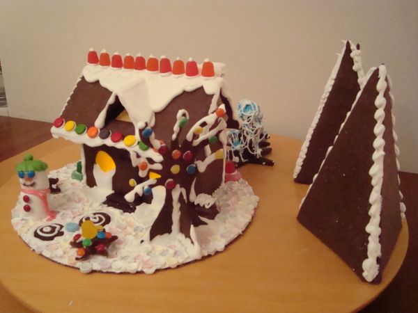 Gingerbread House With Candle-lit Windows