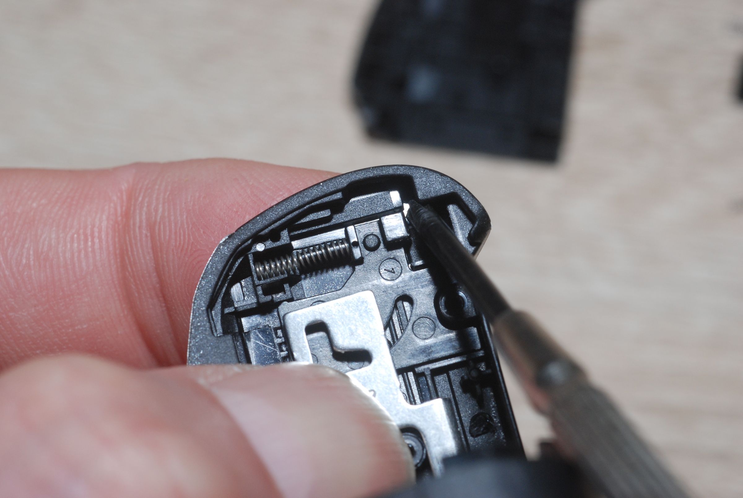 Replacement of Canon PowerShot SX130IS Battery Compartment Door 4