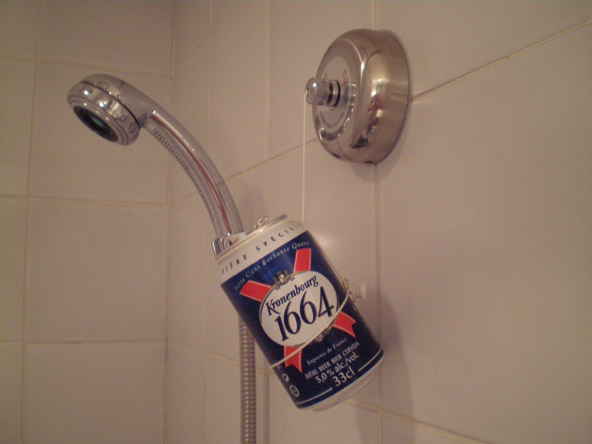 Keep your beer from getting showered while in the shower Part 1: Make yourself smell like roses while stopping to smell them.