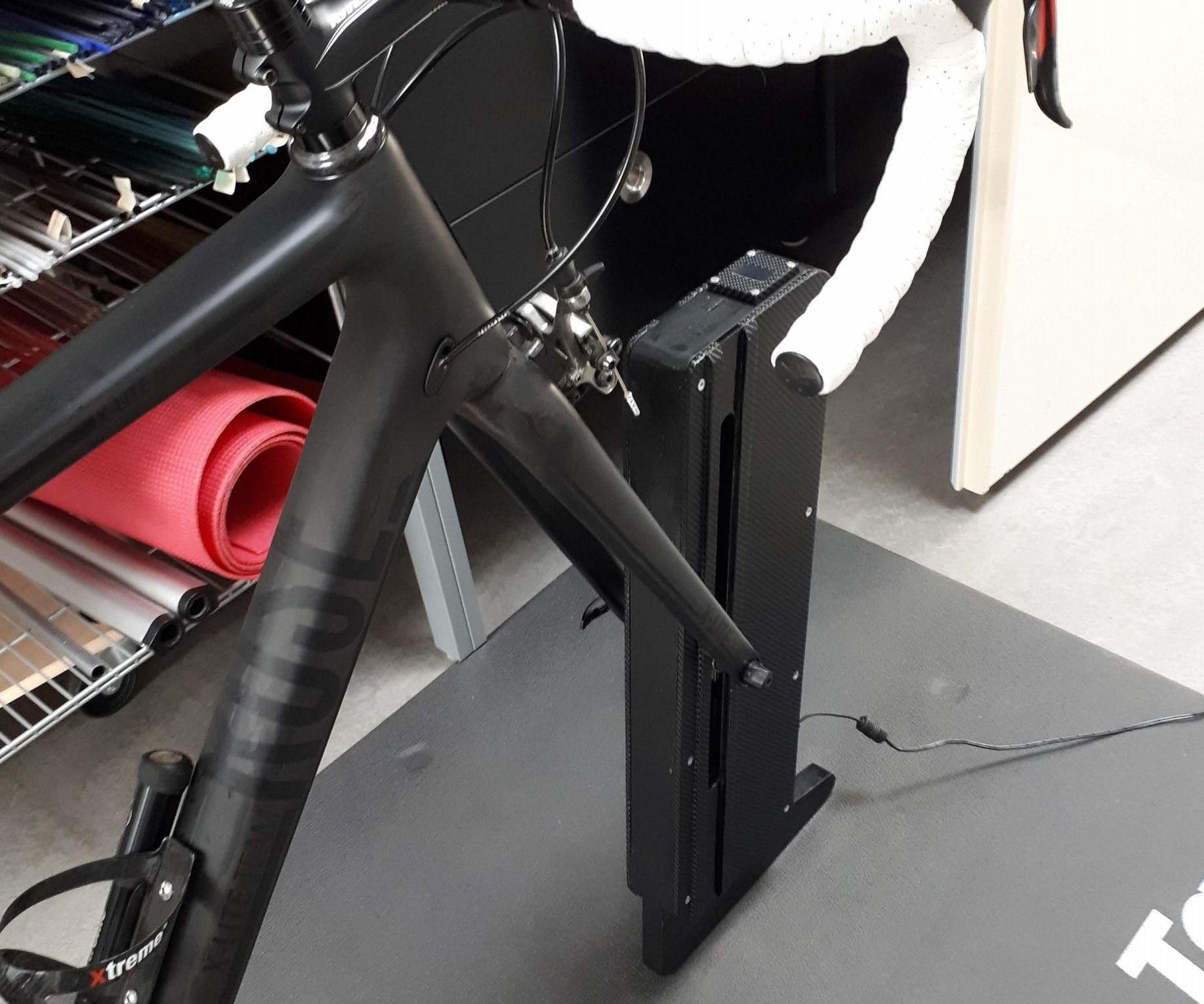 SIMCLINE - Simulation of Changing Road Incline for Indoor Cycling