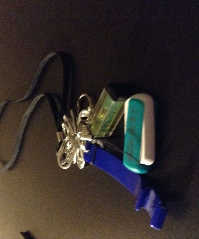 Making necklaces with recycle tin can pull tabs