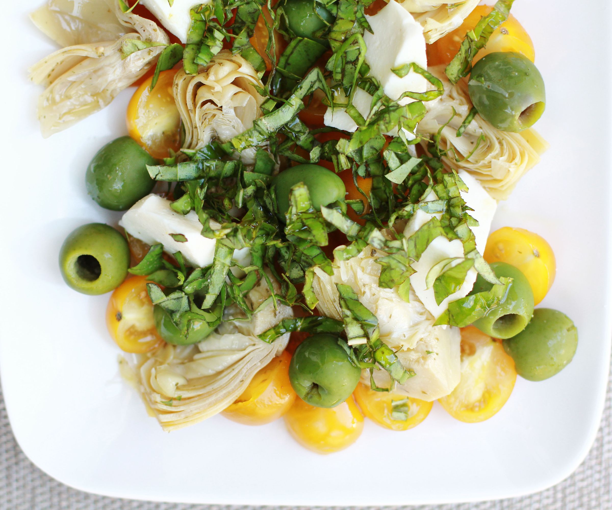 Golden Tomato, Green Olive, Artichoke, and Mozzarella Salad