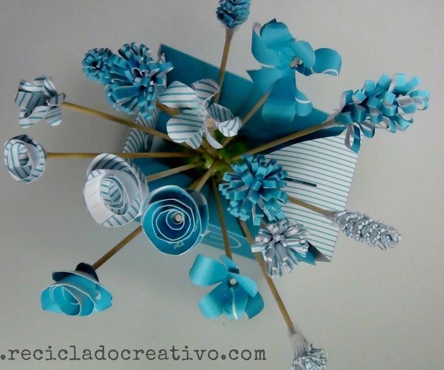 Bouquet of Blue Flowers Recycling a Blue Box