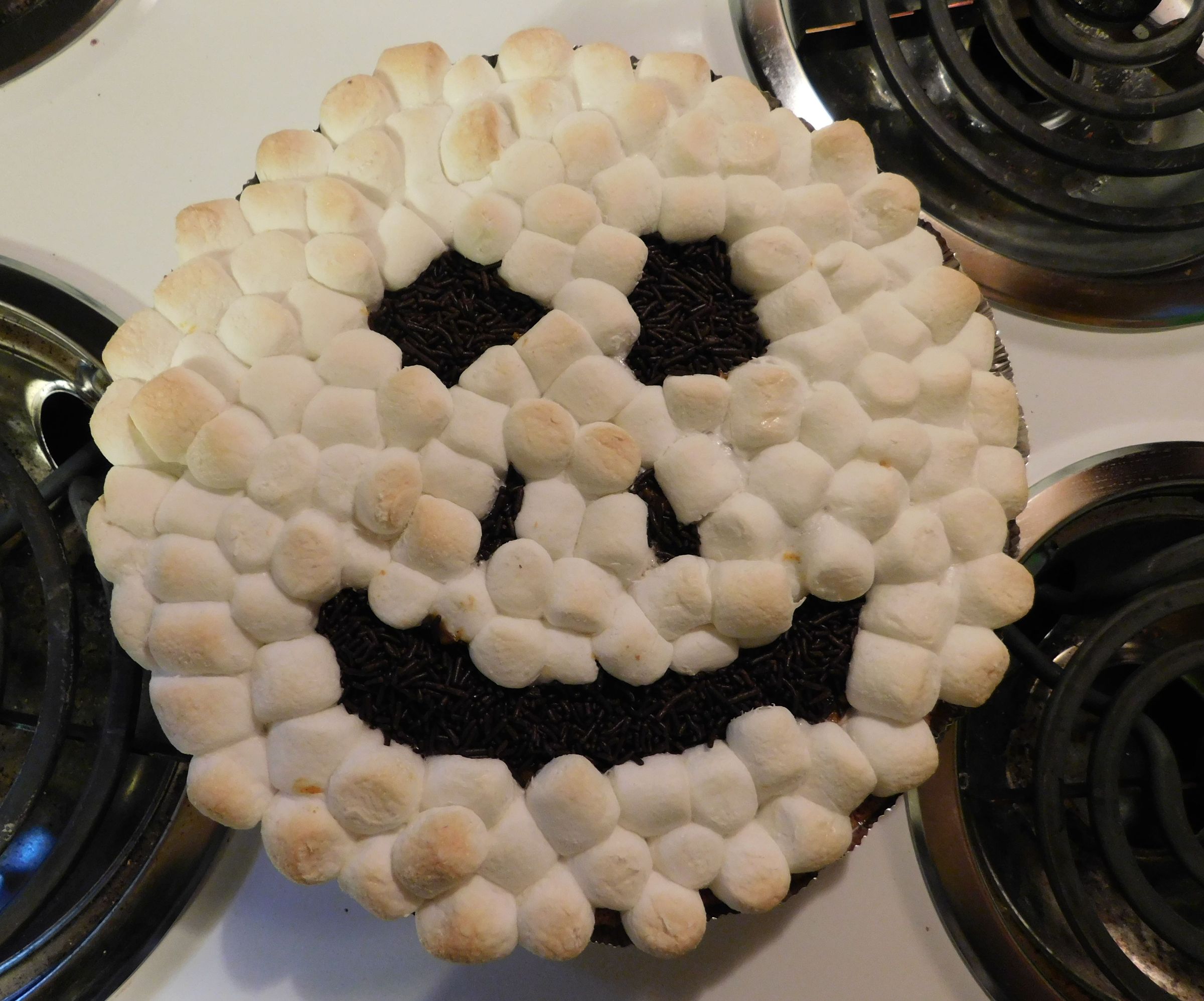 Skull Faced Pumpkin Cheese-Cake Pie