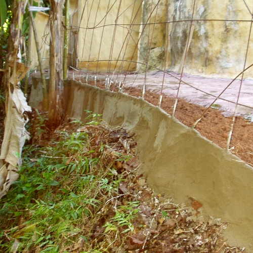 Garden Retaining Wall -- Plastic Window Screen and Cement
