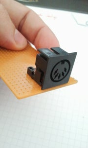 Enlarging the Holes of a Perfboard - Mac Gyver Style