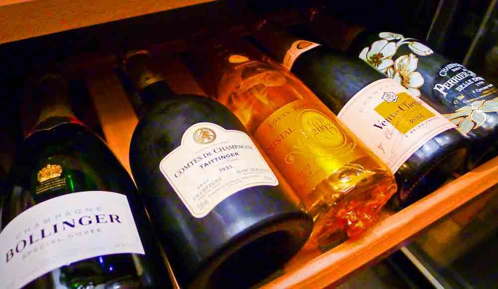 The anatomy of a Champagne bottle & how to open