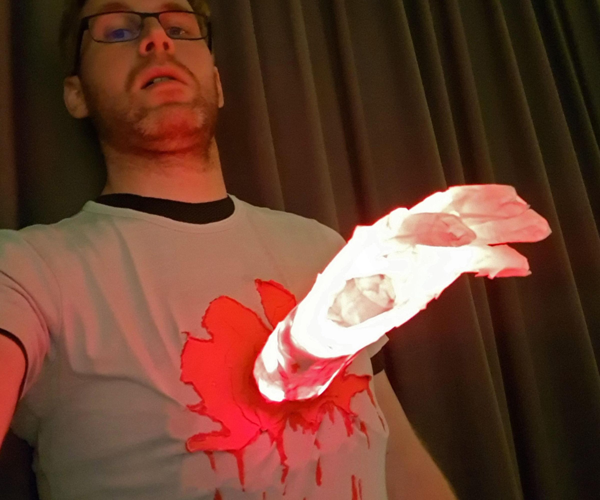Last-minute Glowing Hand Bursting From Chest Halloween Costume
