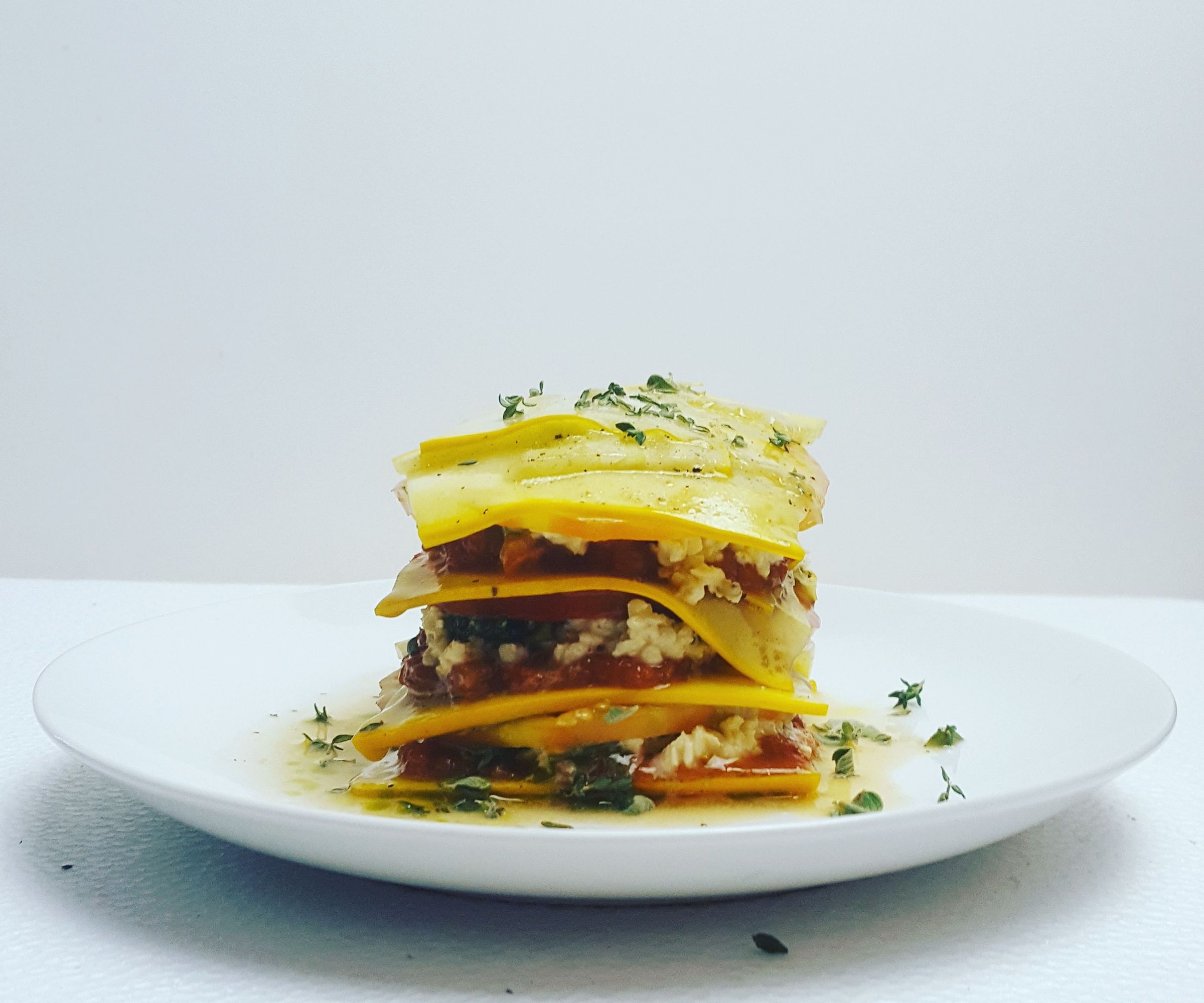 Zucchini and Tomato Lasagne With Basil Pistachio, Tomato Sauce, and Pignoli Ricotta