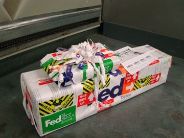 How to Wrap Presents by Stealing From Work or Gifted With the Gift of Wrap