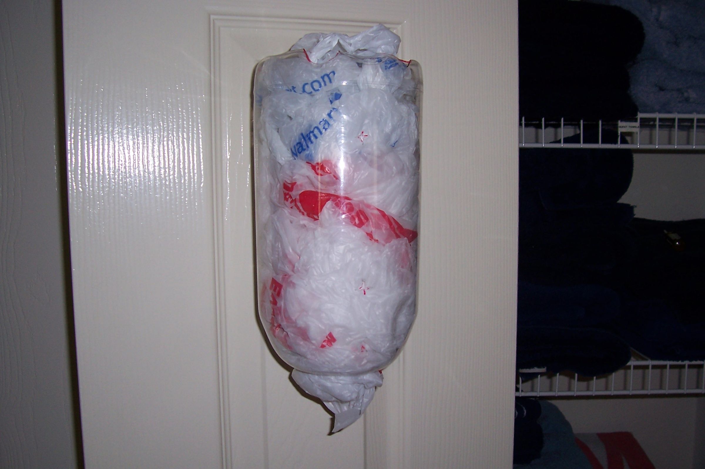Plastic Bag Dispenser. Reuse a Plastic Three Liter and Plastic Bags.