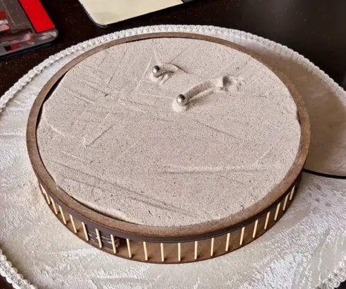 Create a Mesmerizing Kinetic Sand Table With Just One Motor