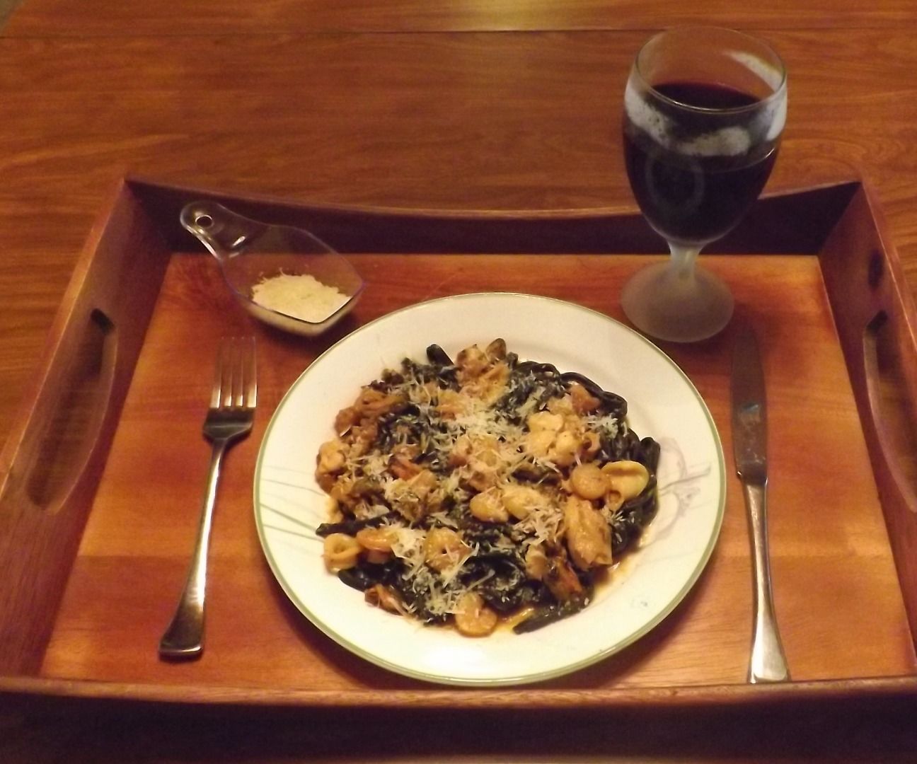 BLACK SQUID INK LINGUINE TOPPED WITH a MEDLEY OF SEAFOOD