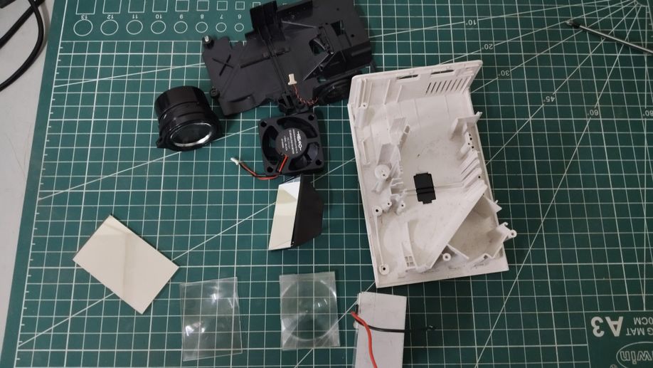 DISASSEMBLING THE OPTICAL SYSTEM