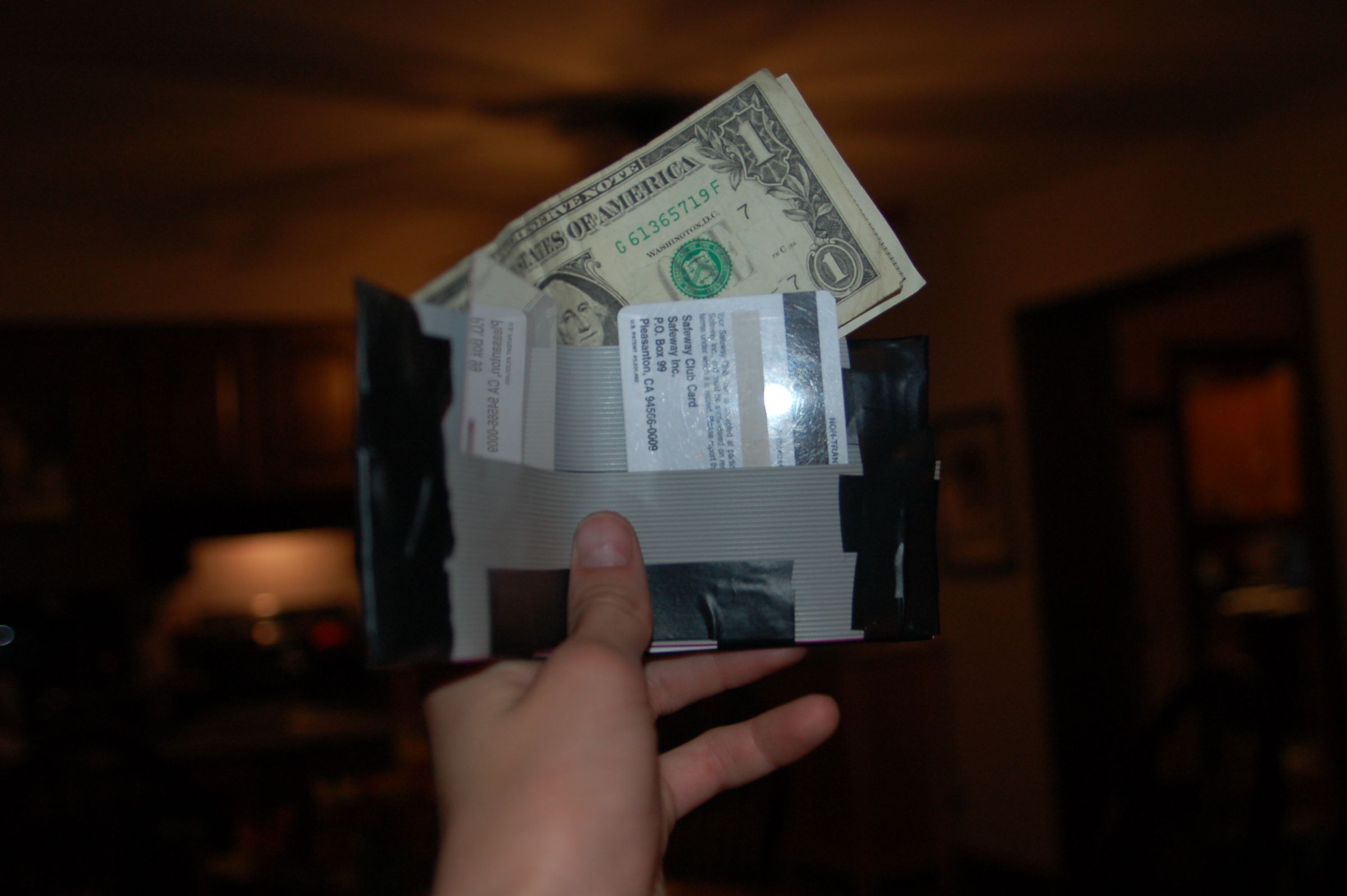 Durable Wallet made from old floppy disk cables.