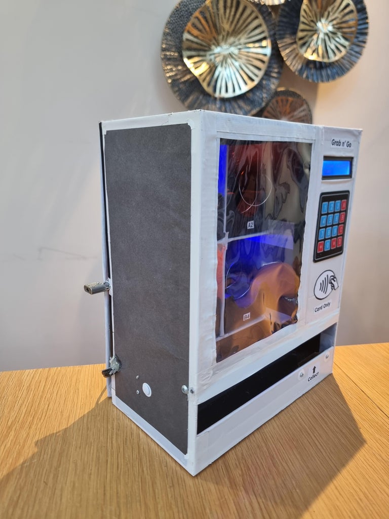 Craft Your Own Desktop-Sized Cardboard Vending Machine With an Arduino ...