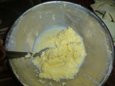 Use a Spoon to Drain Out Milk / Whey From the Butter