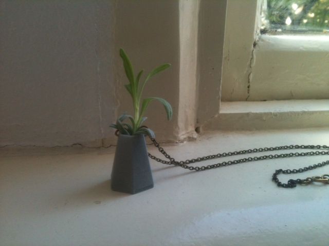 Wearable mini vase