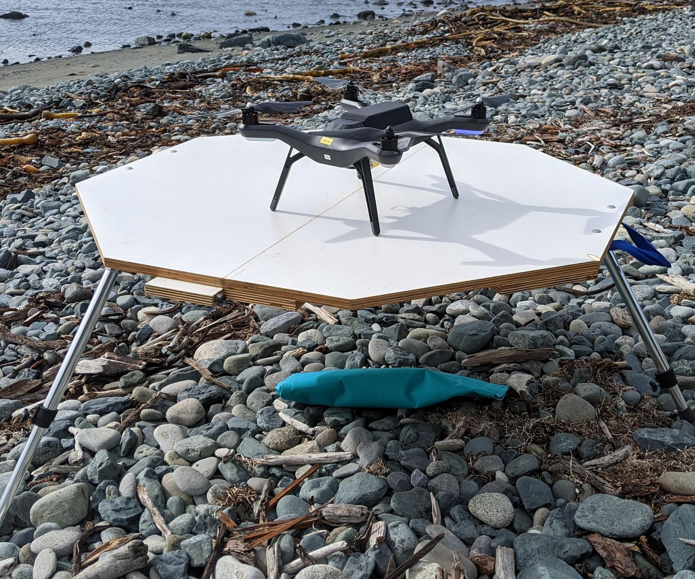 Quadcopter Landing Pad With Telescoping Legs for Uneven Ground