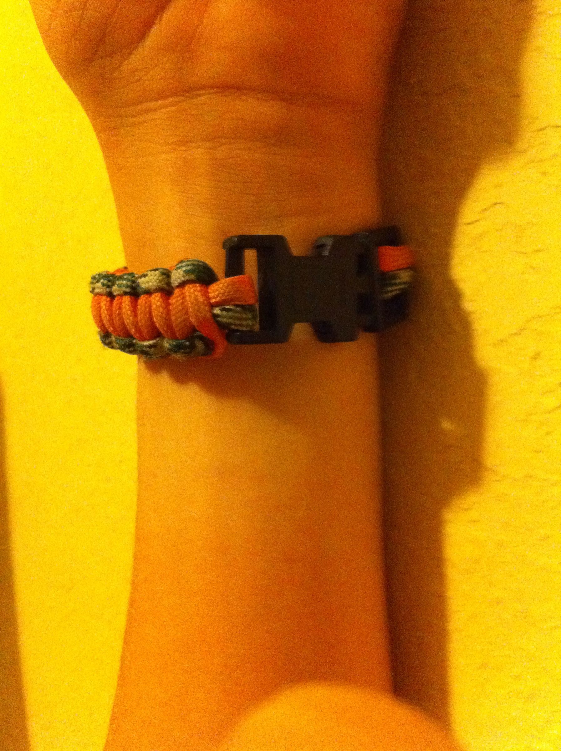 The Easiest Way on Putting on a Paracord Bracelet 4 Steps Instructables