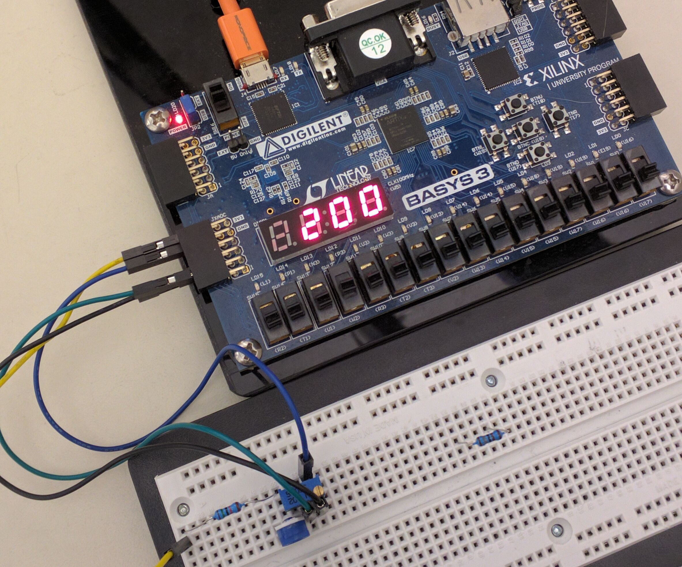 BASYS-3 Flow Metering ANALOG TO DIGITAL Using Vhdl and the XADC