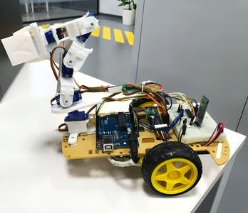 Two-Wheeled Drive Car With a Robotic Arm